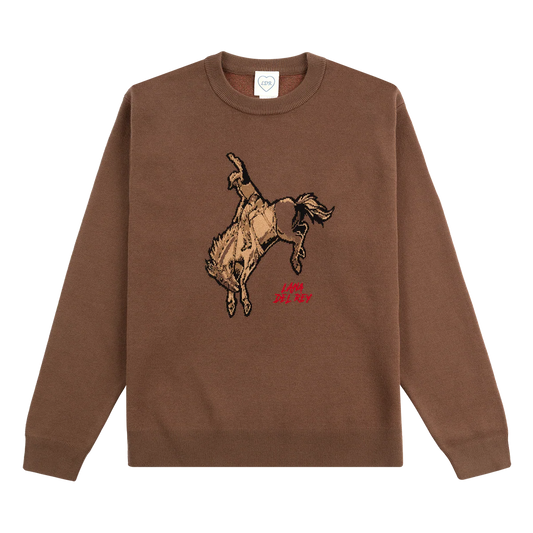 Front view of the Lana Del Rey Indio Brown Knit Crewneck Sweater featuring a vintage bucking horse knit graphic with red Lana Del Rey logo embroidery on a premium brown heavyweight crewneck inspired by her Indio festival collection.