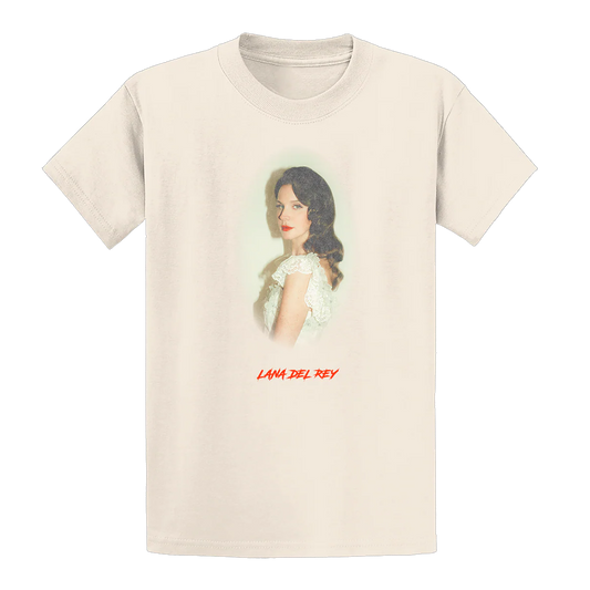 Front view of the Lana Del Rey Indio Portrait T-Shirt featuring a cream short-sleeve tee with a soft vintage portrait of Lana Del Rey and signature logo, inspired by her Indio festival performance and exclusive concert merchandise collection.