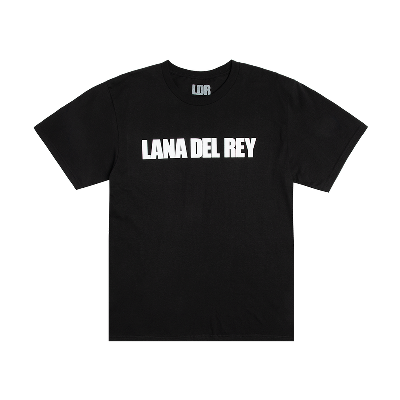 Front view of the Lana Del Rey Logo Black T-Shirt featuring a bold white Lana Del Rey logo printed across the chest on a classic black cotton tee with a clean minimalist design.