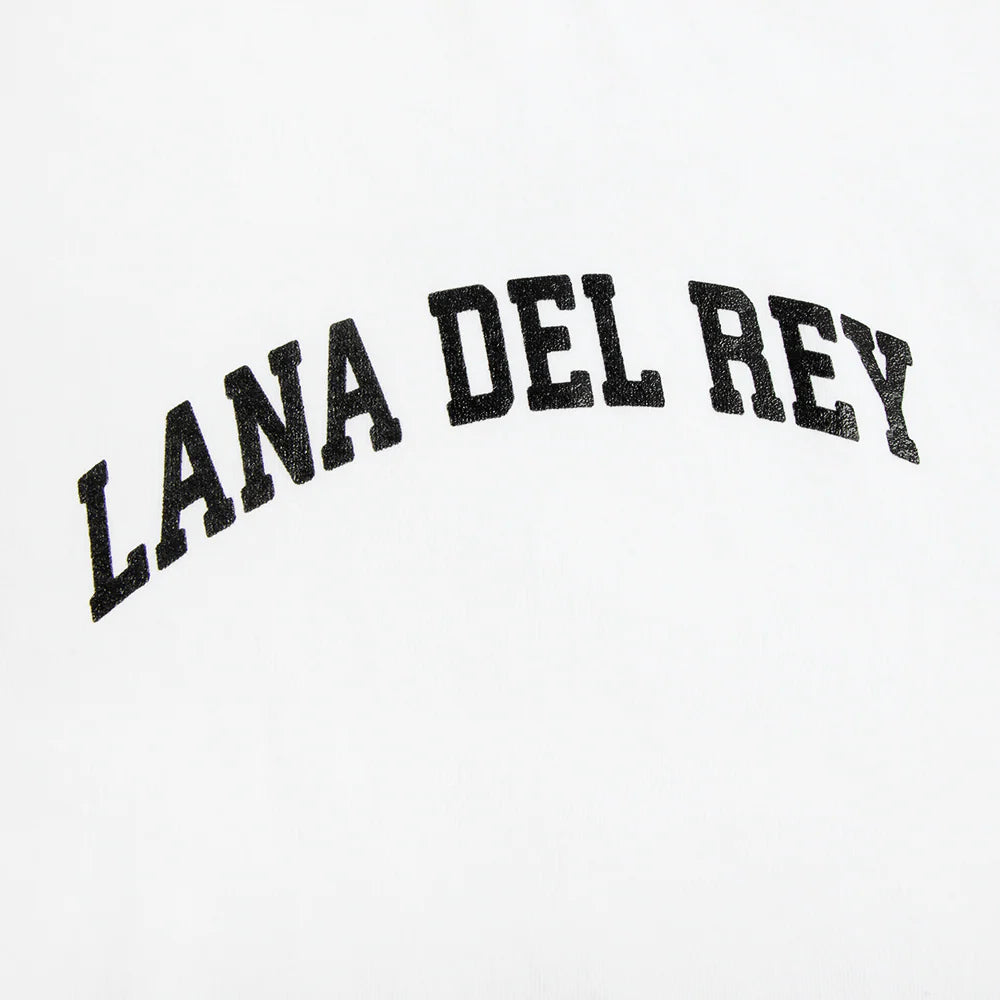 Close-up detail of the Lana Del Rey Logo White T-Shirt showcasing the curved black Lana Del Rey wordmark printed on white cotton fabric with a textured vintage-style graphic finish.