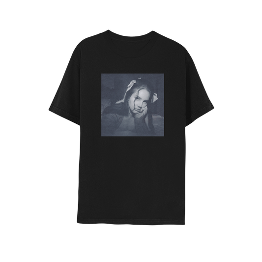 Front view of the Ocean Blvd Black Album Cover T-Shirt featuring a monochrome Lana Del Rey portrait graphic on a black cotton tee inspired by the Did You Know That There's a Tunnel Under Ocean Blvd album, vintage-style Lana Del Rey merch.