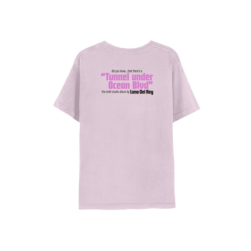 Back view of the Ocean Blvd Lilac Illustration T-Shirt with the Tunnel Under Ocean Blvd album title printed in lavender and black text on a soft lilac graphic tee celebrating Lana Del Rey's ninth studio album.