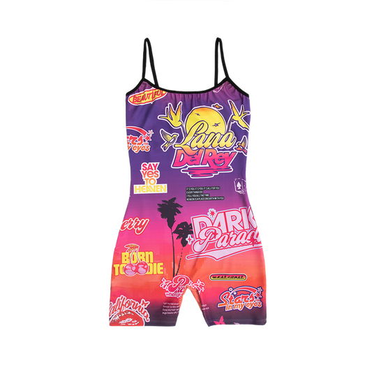 Front view of the Paradise Print Bodysuit featuring an all-over sunset gradient with Lana Del Rey logo, Dark Paradise, Born to Die, Say Yes to Heaven, birds, palm trees, cherries, and retro-inspired graphics on a fitted sleeveless bodysuit.