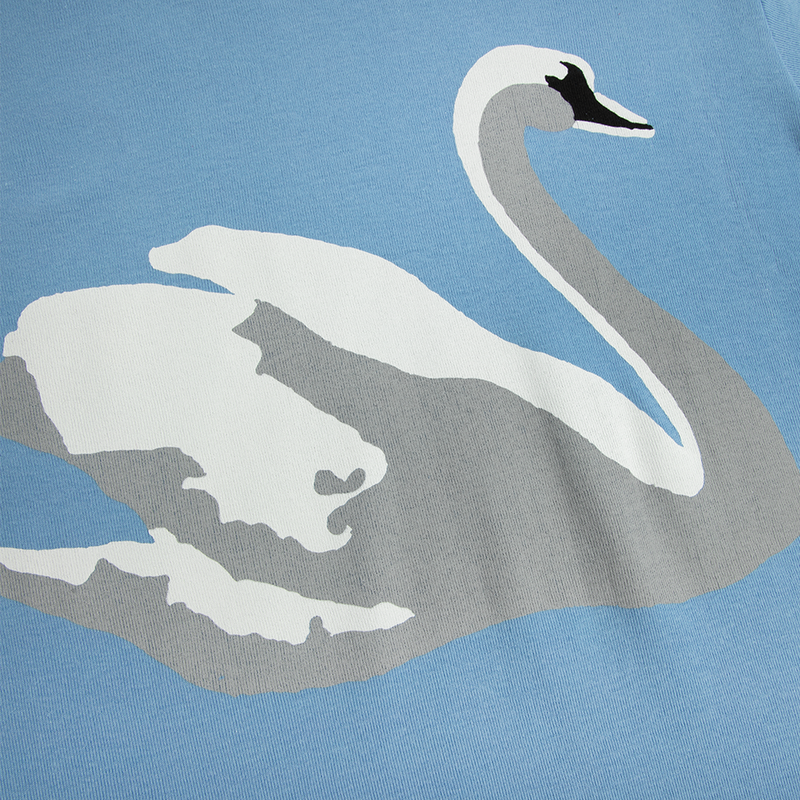 Close-up detail of the Swan Blue Cropped T-Shirt showcasing the oversized white swan illustration printed on soft blue cotton, highlighting the elegant artwork and dreamy Lana Del Rey-inspired aesthetic.